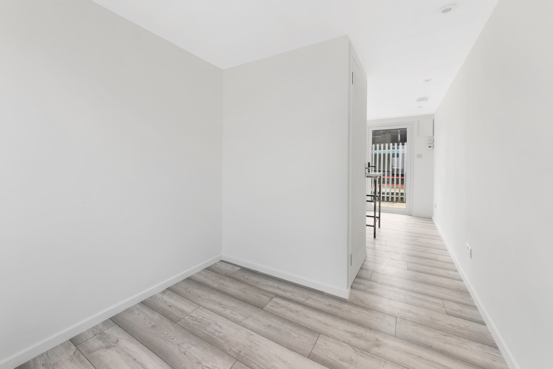 Internal partition and hallway inside a 20 ft container conversion