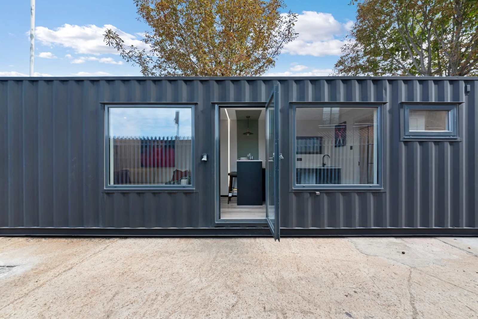 Residential Unit 27 exterior with large windows and glazed entrance