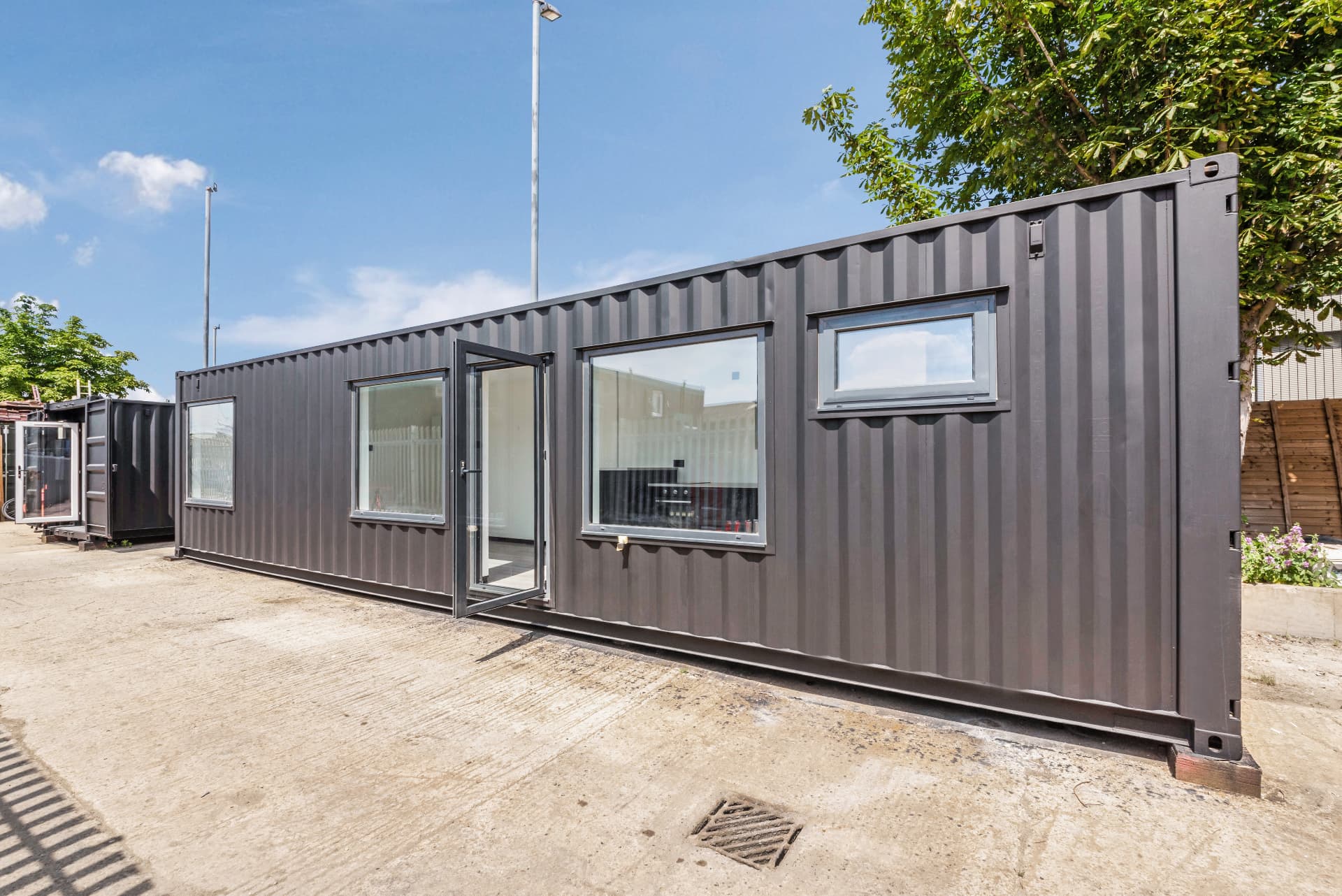 Finished 40 ft container conversion with windows and glazed entrance door
