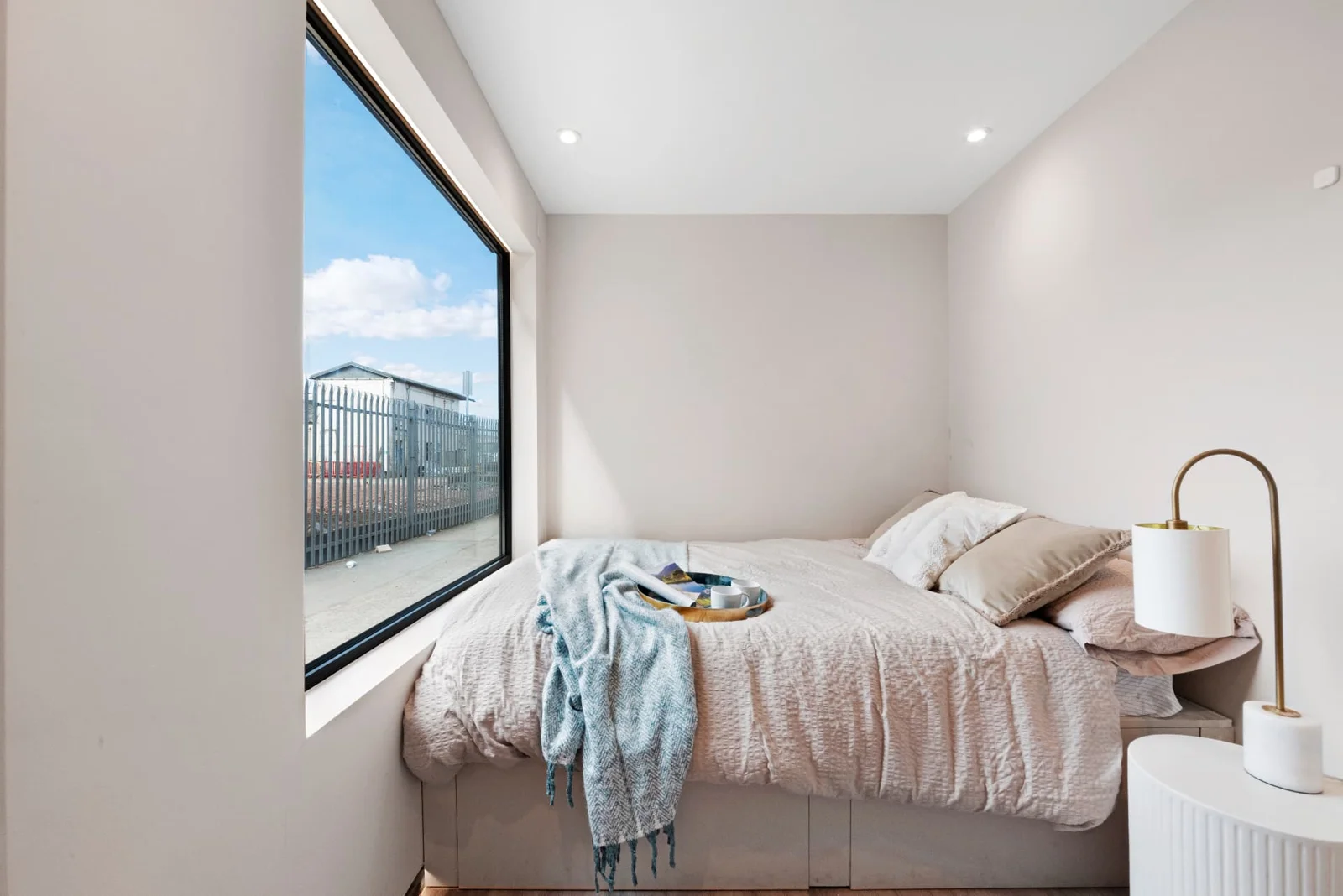Residential Unit 27 separate bedroom with a large picture window